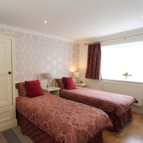 Two Sinlge Beds in our Plum room